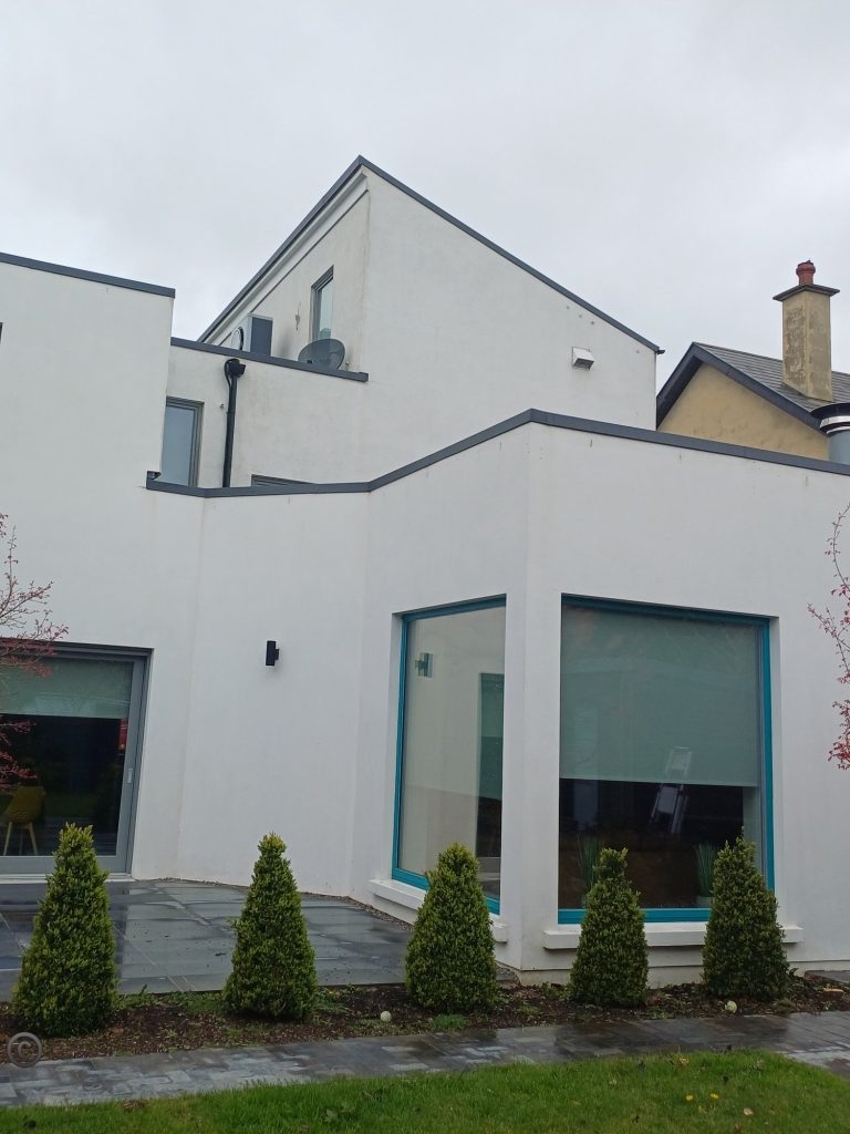 Clean white render on a modern Cork home after the Gold Standard Full House Softwash